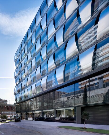 ConceptWall 50 Façades and ConceptSystem 68 Doors - Blue building located in Madrid, Spain