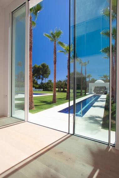 ConceptSystem 77 Doors, ConceptPatio 68 Sliding & Folding and HiFinity Sliding & Folding - Las Palmeras located inSpain